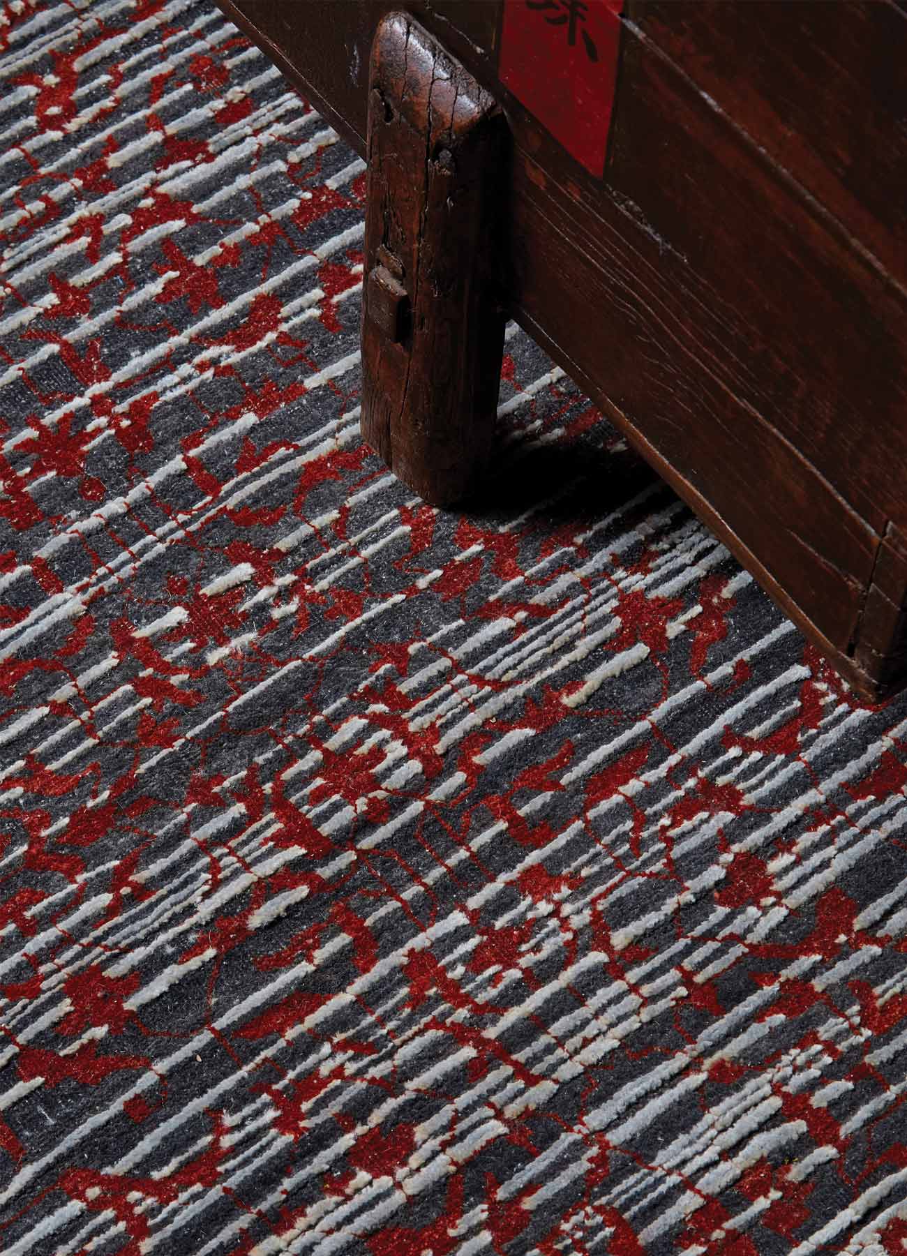 Hand woven wool and silk rug